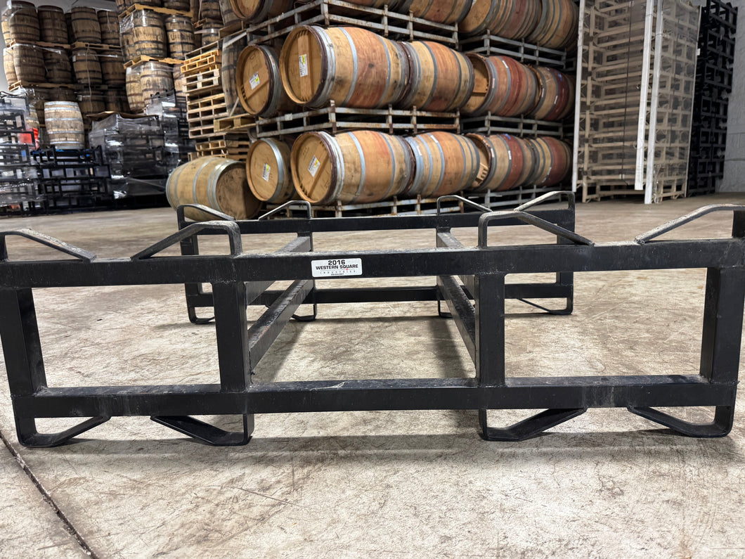 7in 2 bar 2 barrel used barrel racks black & tan. Strong enough to stack 4-5 high. Western Square style Industry standard rack for wine and spirit barrels.